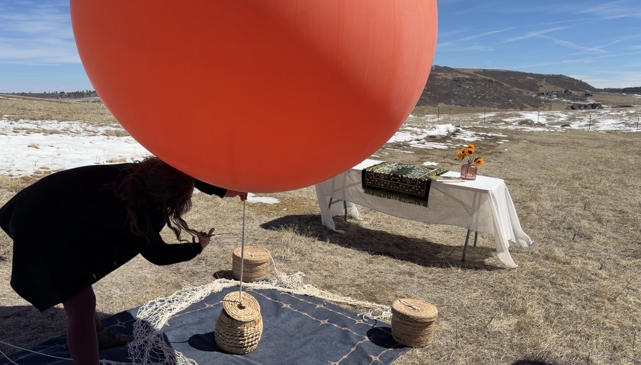 Preparing the weather balloon for a memorial ceremony